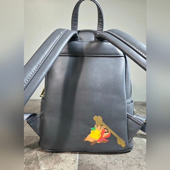 LOUNGEFLY DISNEY CINDERELLA VILLAINS BACKPACK. - Picture 2 of 7